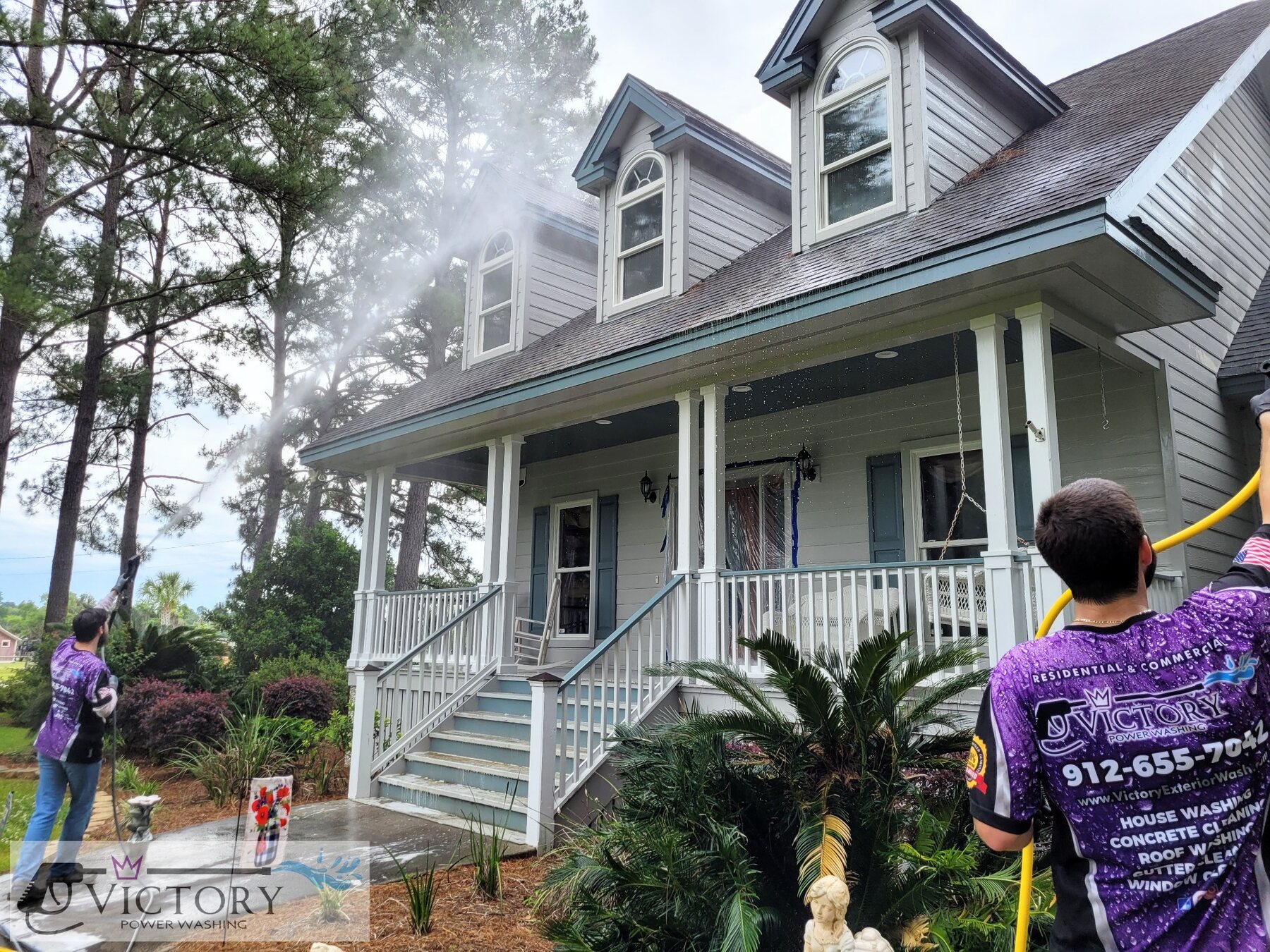 Victory Power Washing team cleaning the exterior of a Lowcountry home